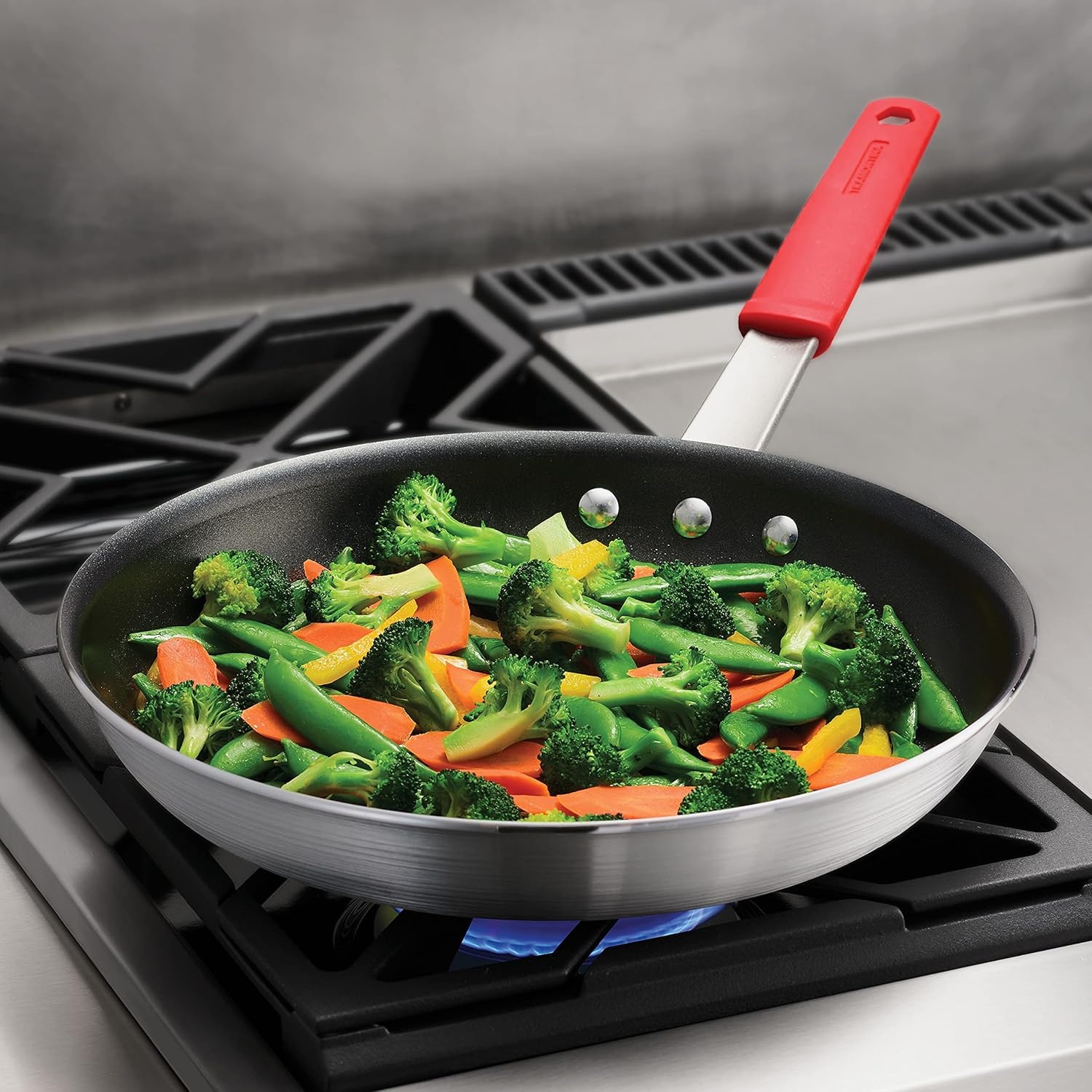 image:imageTramontina Professional 12Inch Non Stick Large Frying Pan HeavyGauge Aluminum Skillet with Reinforced Nonstick Coating Red Handle Dishwasher and Oven SafeNonstick Red handle