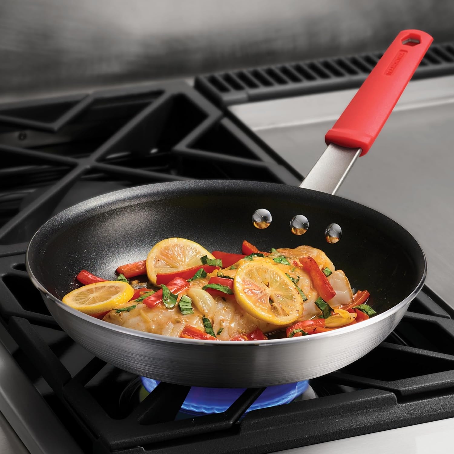image:imageTramontina Professional 12Inch Non Stick Large Frying Pan HeavyGauge Aluminum Skillet with Reinforced Nonstick Coating Red Handle Dishwasher and Oven SafeNonstick Red handle